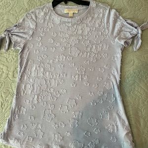 Michael Kors, Light pale lavender.